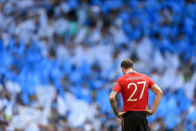 Weghorst looks dejected after United's defeat to City. Image: Alamy