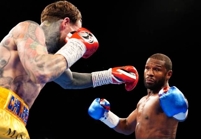 Floyd Mayweather and Aaron Chalmers during their exhibition bout. Image: Alamy 