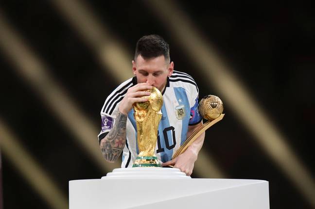 Messi kisses the trophy that is now his, nothing else could have been number one moment. Image: Alamy