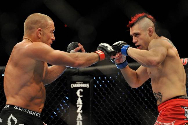 Dan Hardy during his bout against Georges St-Pierre. Image: Getty 