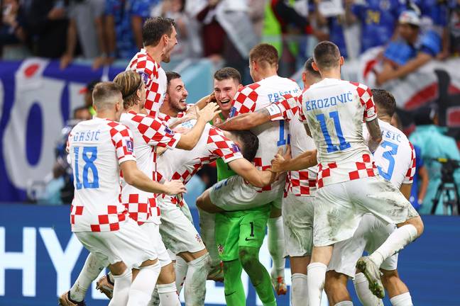 Croatia players celebrate with their goalkeeper. Image: Alamy