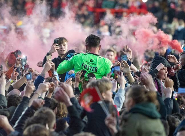 Foster celebrates with the fans. Image: Alamy