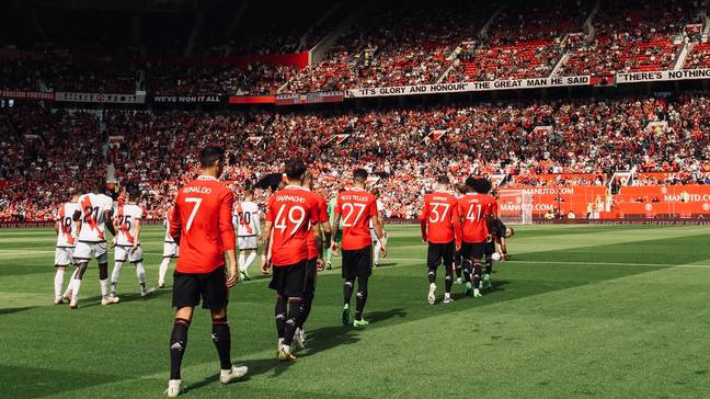 Manchester United players walking out in Old Trafford (Man Utd)