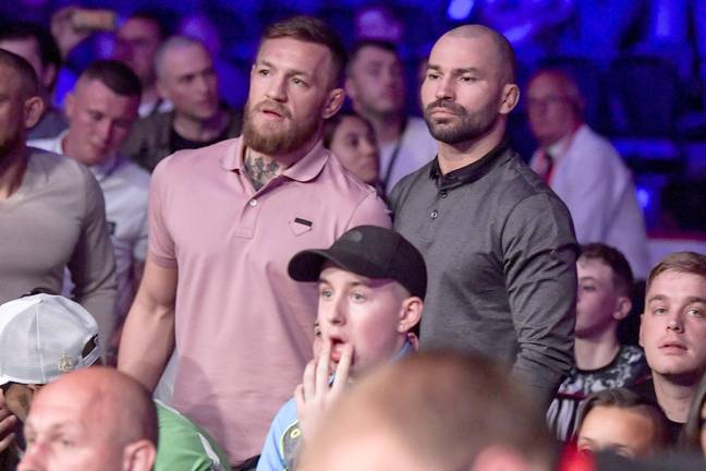 Conor McGregor alongside Artem Lobov at an MMA event in Belfast. Image: Alamy 