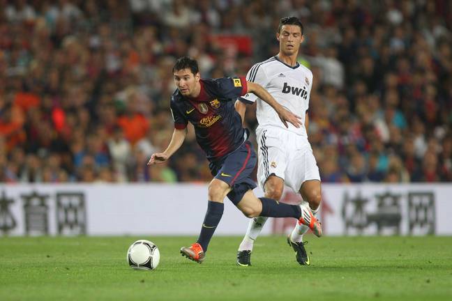 Lionel Messi and Cristiano Ronaldo in action during El Clasico. Image: Alamy 