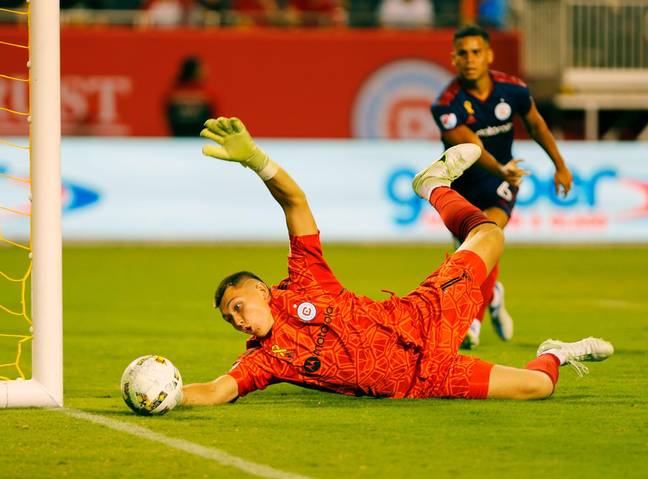 Chelsea-bound Gabriel Slonina saves for Chicago Fire. (Alamy)