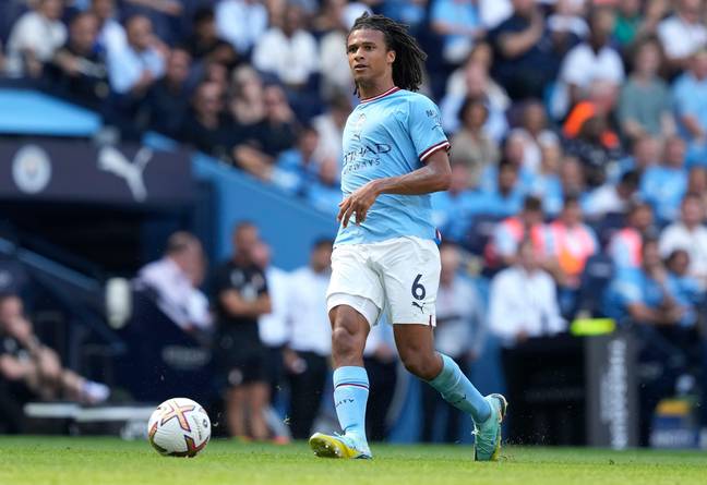 Nathan Ake in possession for Manchester City. (Sportimage / Alamy)