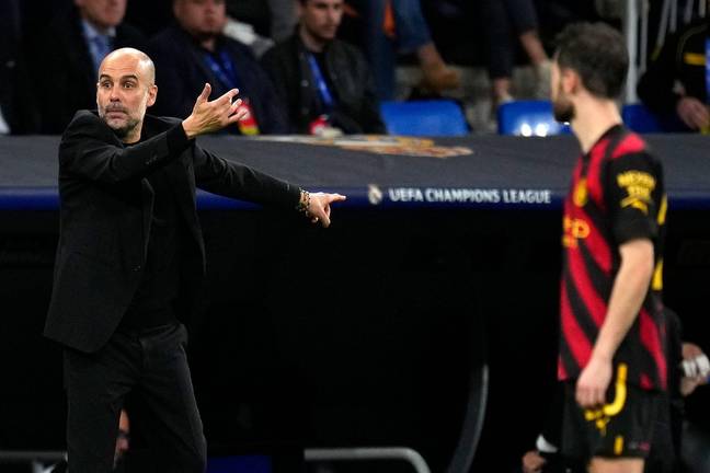 Pep Guardiola gestures on the touchline. Image: Alamy 
