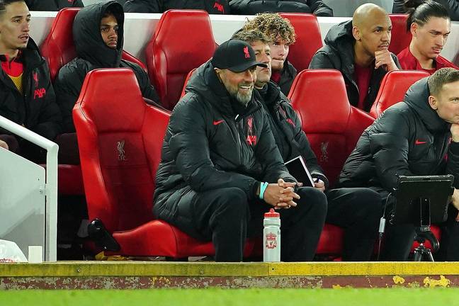 Jurgen Klopp watches on with his coaching team. Image: Alamy 