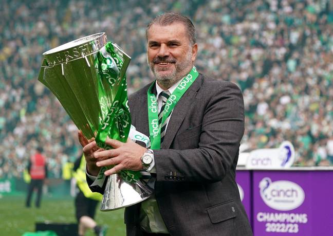 Angelos Postecoglou celebrates with the league trophy. Image: Alamy