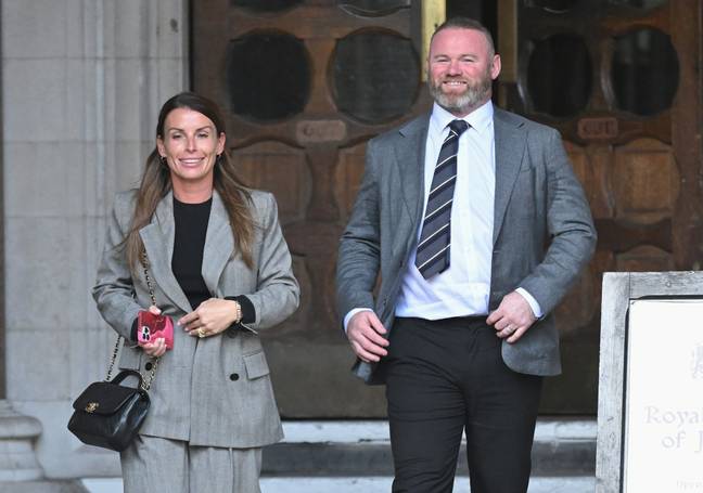 Coleen Rooney and Wayne Rooney leave court. Image: Getty 