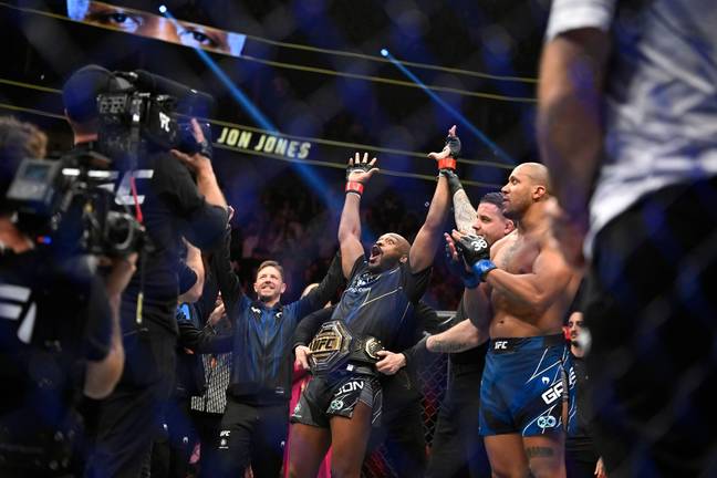 Jon Jones gets the UFC title wrapped around his waist after beating Ciryl Gane, Image: Alamy