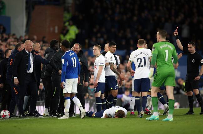 Tottenham's Harry Kane left on the floor following an altercation with Everton midfielder Abdoulaye Doucoure