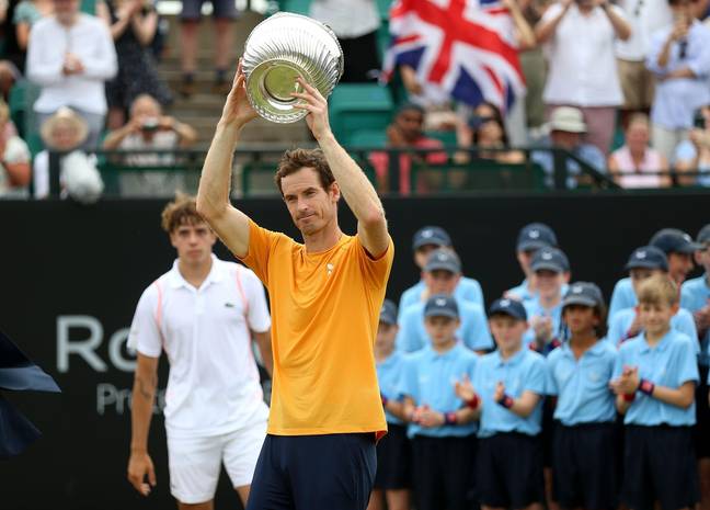Murray lifts his latest piece of silverware. Image: Alamy
