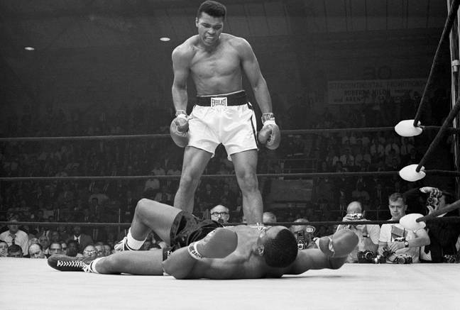 Muhammad Ali stands over Sonny Liston during their title fight. Image: Getty