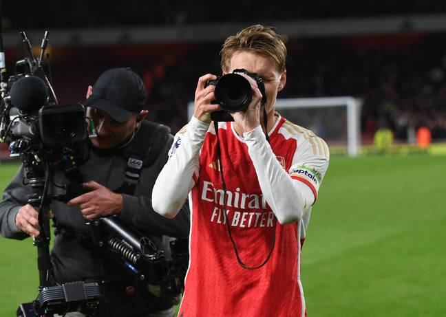 Martin Odegaard celebrates Arsenal's win over Liverpool. Image: Getty 