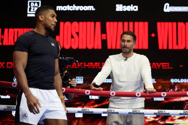 Anthony Joshua with Eddie Hearn during an open workout. Image: Getty 