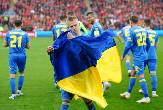 Zinchenko with a Ukraine flag ahead of their World Cup qualifier last year. Image: Alamy