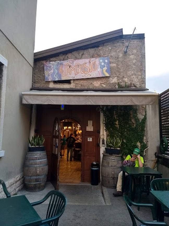 The man ran out the Simposio Bar in Italy without paying his bill 15 years ago. Credit: Google