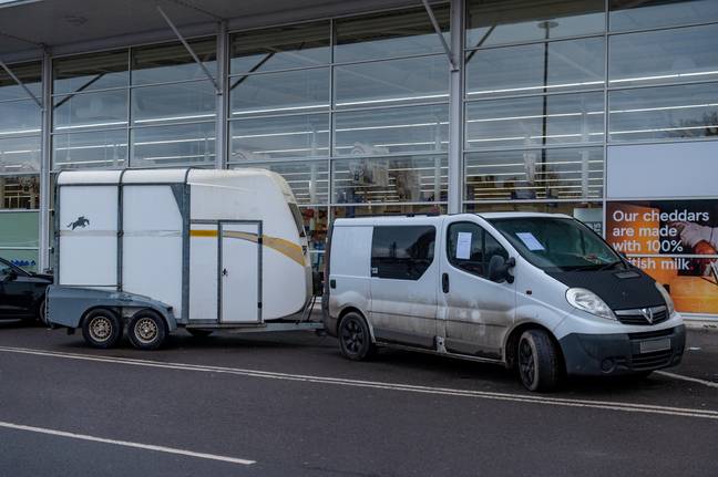 His van and an attached horse box are parked near the entrance of the supermarket. cREDIT: swns