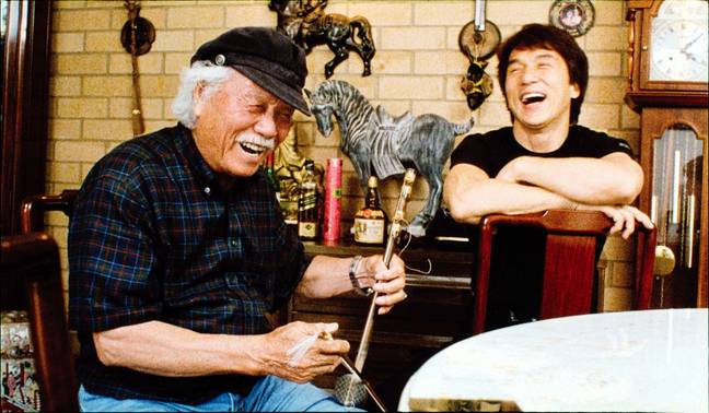 Chan with his father in a 2003 documentary. Credit: Album/Alamy Stock Photo