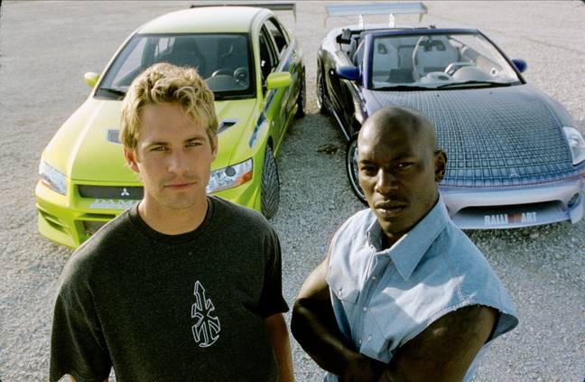 Walker and Gibson on the set of 2 Fast 2 Furious in 2003 Credit: Universal Pictures