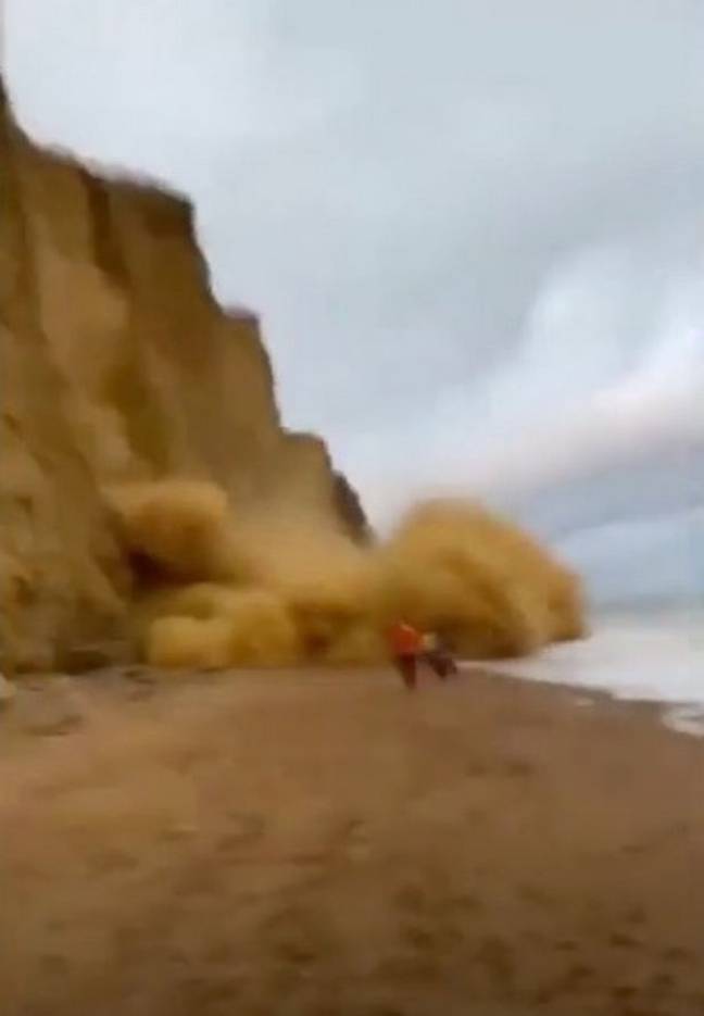 Beach-goers ran away as the cliff collapsed. Credit: Daniel Knagg/Dorset Council UK