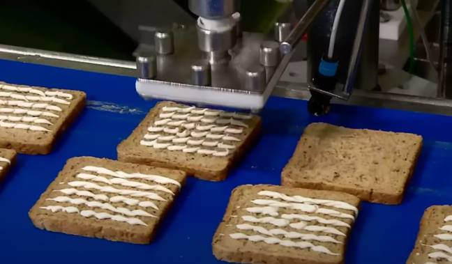 The video also showed how machinery can speed up the process of sandwich making tasks like adding mayonnaise. Credit: Science Channel 