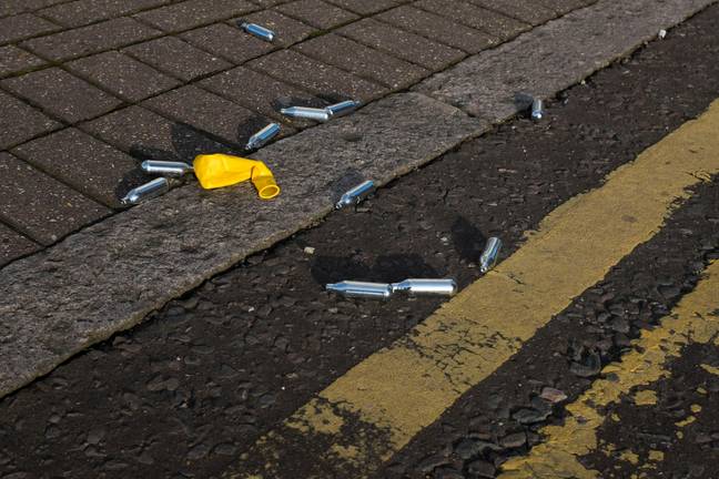 Laughing gas is stored in those little metal canisters you can find littered everywhere. Credit: Alamy