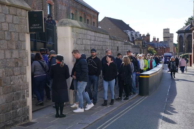 People queue outside as Windsor Castle and St George's Chapel reopen to public for first time since Queen Elizabeth II's death. Credit: PA Images/Alamy Stock Photo