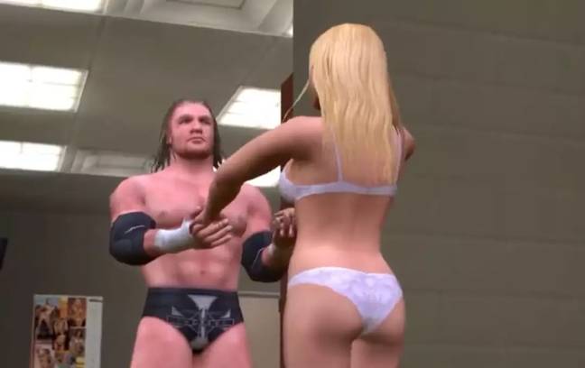 Triple H and Torrie Wilson don't keep things PG in the game. Credit: Yukes