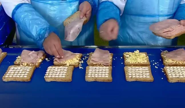 The documentary shows workers adding fillings to the sandwiches for one of the processes. Credit: Science Channel
