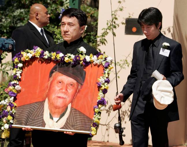 Chan carrying a portrait of his late father. Credit: REUTERS/Alamy Stock Photo