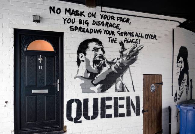 Covid-19 mask wearing Freddie Mercury / Queen graffiti art, Skipton, North Yorkshire, UK. Credit: John Bentley / Alamy 