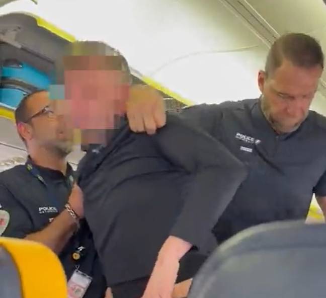 Police had to help the passenger get off the plane as he could barely stand. Credit: X/@Jostanley936