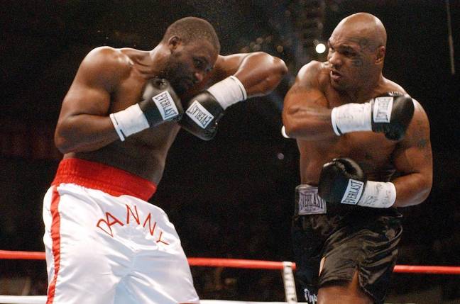 Mike Tyson (right) in action against England's Danny Williams during their heavyweight contest at the Freedom Hall in Louisville, Kentucky, USA. Tyson was knocked out by Williams in the fourth round. Credit: PA Images / Alamy Stock Photo