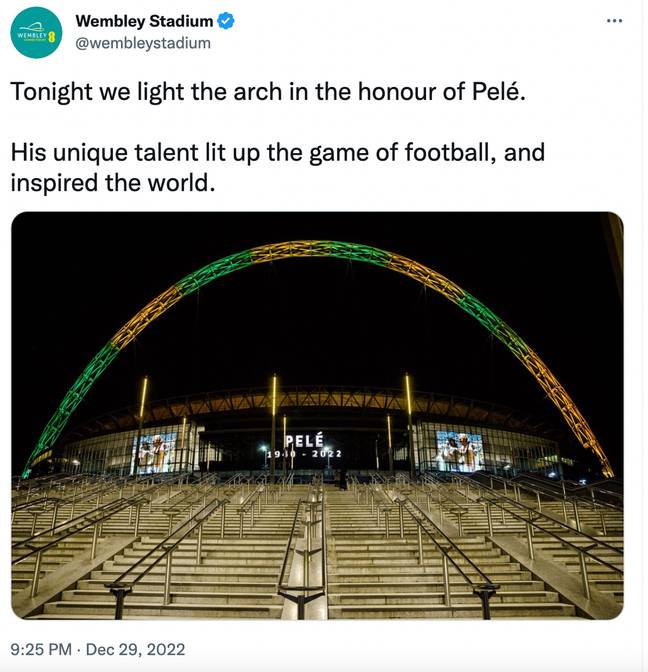 Wembley Stadium lit up with Brazil colours in honour of Pele. Credit: @wembleystadium/Twitter