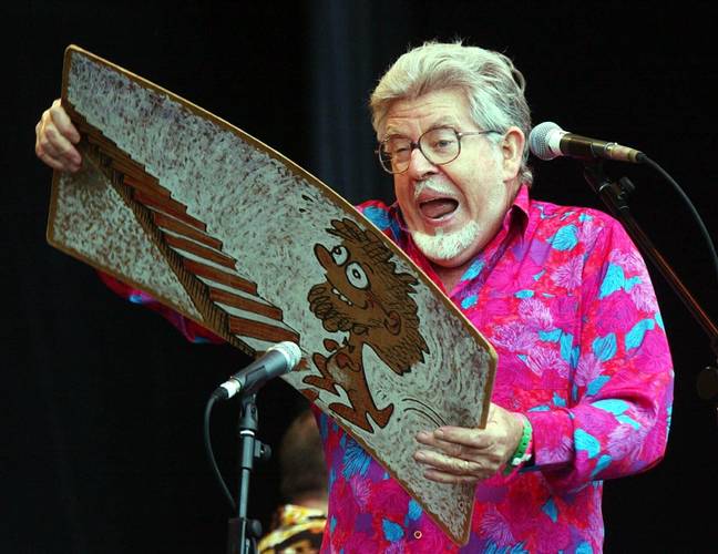 Rolf Harris plays the main stage at Glastonbury in 2002. Credit: PA Images/Alamy