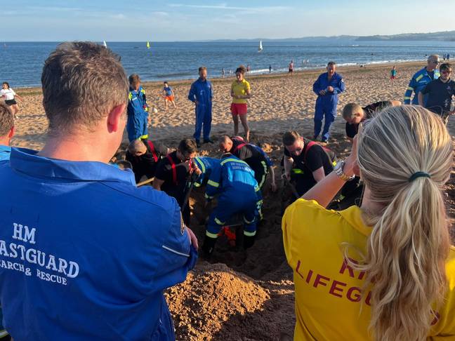 Photo of a 2022 training exercise at Exmouth Beach. Credit: Twitter/@HMCG_AC10