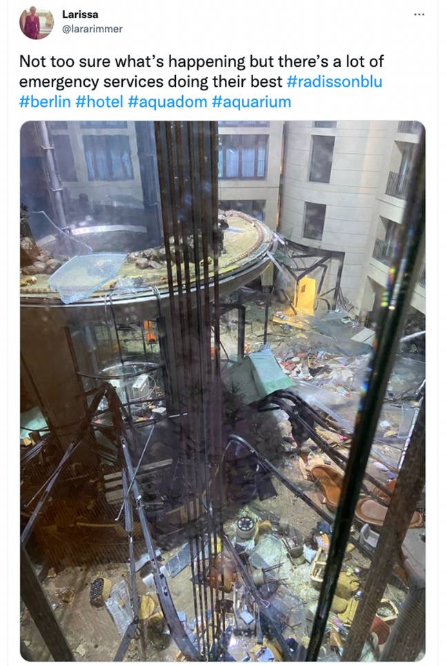 The aquarium, believed to contain up to 1,500 tropical fish, exploded at the Radisson Blu hotel in Berlin. Credit: Twitter