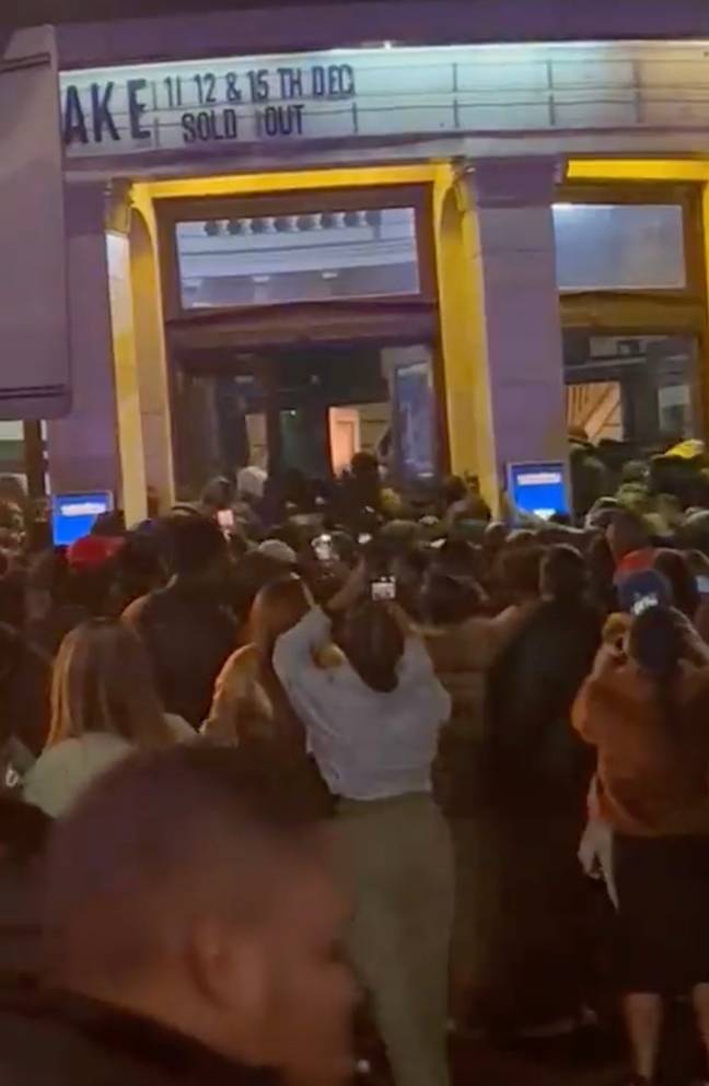 Crowds were filmed rushing through the doors. Credit: Twitter/@__93_Mide