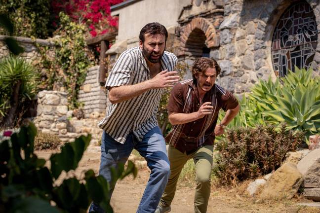Nic Cage with absolute daddy Pedro Pascal in The Unbearable Weight of Massive Talent. Credit: Lionsgate