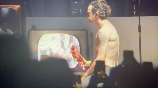 Matty Healy has been filmed eating raw meat on stage at The 1975 concert in Madison Square Garden. Credit: Twitter/@strghtoutamag