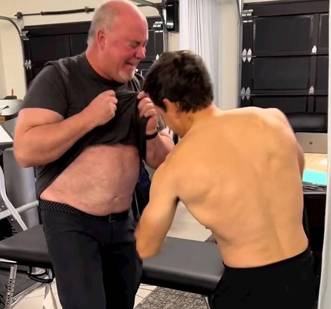 The actor showed off his strength by playfully punching a friend in the stomach, at least we hope it was playfully. Credit: Instagram/@markwahlberg