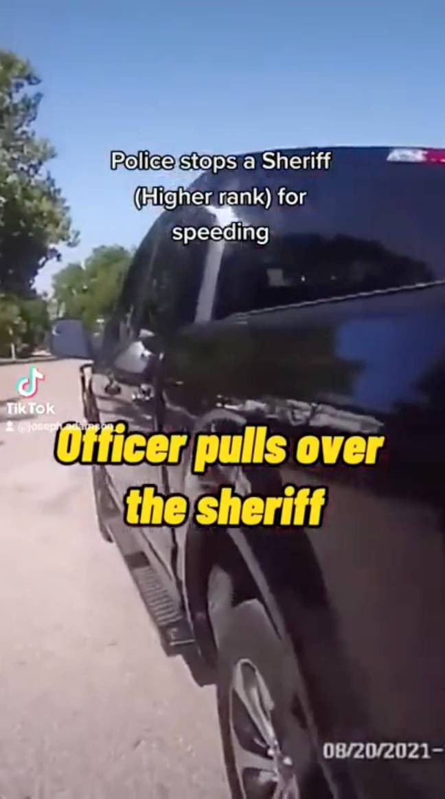 Officer Henry pulled over the unmarked black truck. Credit: TikTok