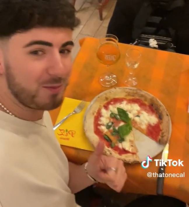 Callum flew to Italy and bought a pizza for less than the price of ordering a Dominos. Credit: TikTok/@thatonecal