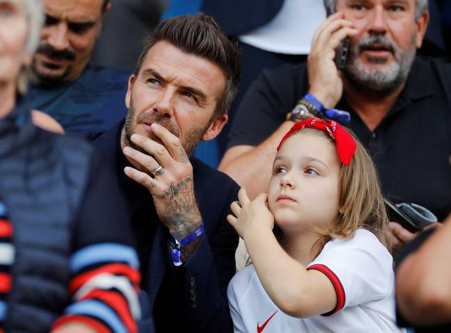 David Beckham and daughter Harper. Credit: Alamy