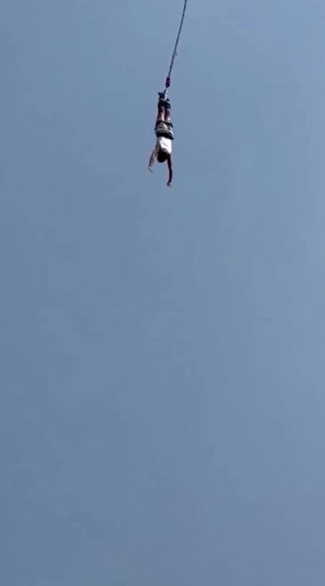 The tourist identified as Mike decided to try bungee jumping. Credit: HK01/CNN