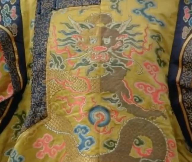 The detailed robe featured a dragon on the front. Credit: BBC