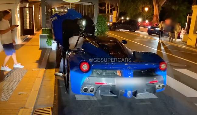 The valet was seen desperately scrambling to get in the luxury car to bring it to a halt. Credit: YouTube/G-E SUPERCARS
